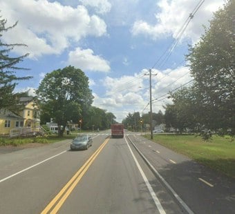 Man Pulled From Burning Stoughton Home, Gun Found as Police Investigate