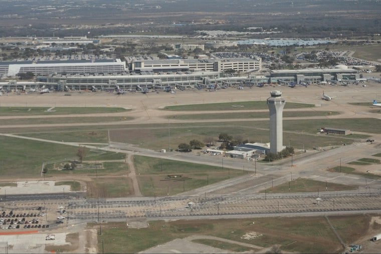 Mayor Watson Brings His Dog to Tour AUS Airport's New Gates and Pet Relief Area