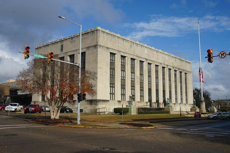 Michigan Senate Candidate’s Father Sits on Board of Charity Tied to Saddam-Era Cash Probe