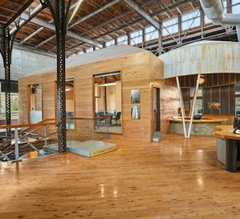 Mid-City's Burnt Canoe Studio Buys $1.6M Building for 35-Studio Second Campus