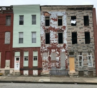 Moore Signs Orders to Fast-Track Maryland Housing, Targets Baltimore Vacants