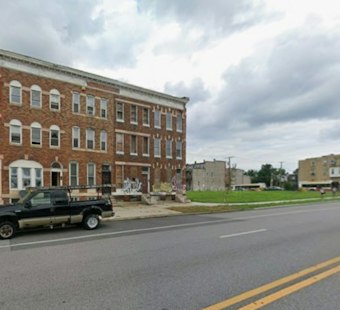 Motorbike Rider Critical After Chevy Bolt Crash on Baltimore's North Avenue