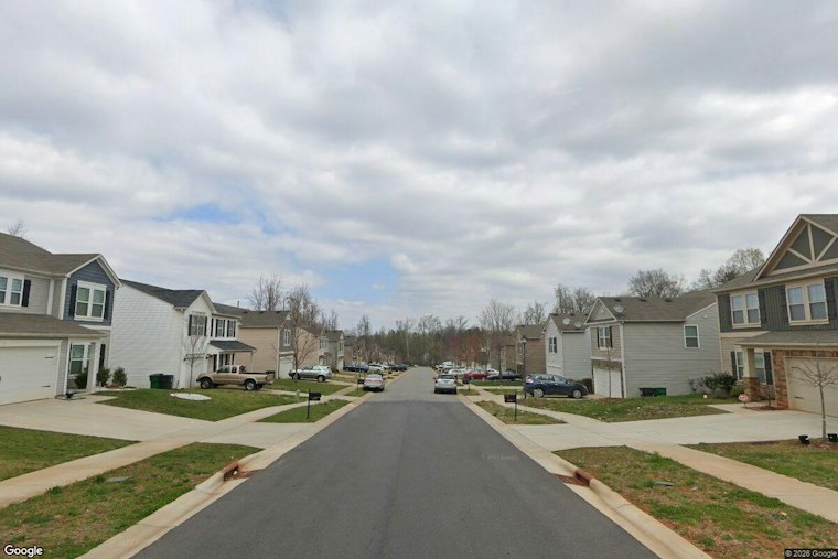 North Charlotte Grandmother Sees Man in Dining Room as Husband Tries to Push Him Out
