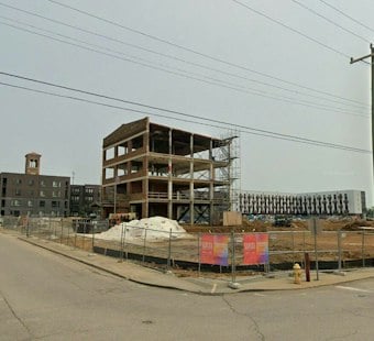 Norwood's Factory 52 Debuts First Townhomes With Garages, Pools in $250M District