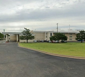 OKC Council Greenlights Holiday Inn's Switch to Apartments After Tree Canopy Fight