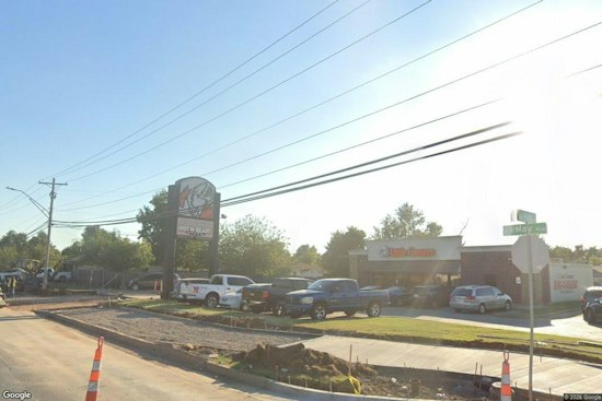 OKC Officer Hurt After Driver Slams Patrol Car, Crashes Into Little Caesar's