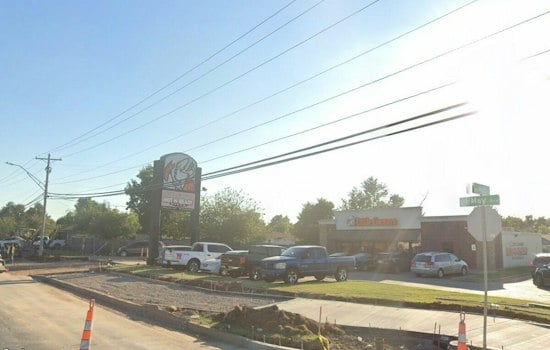 OKC Officer Hurt After Driver Slams Patrol Car, Crashes Into Little Caesar's