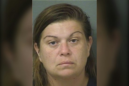 Pensacola Woman Bites, Kicks Officers After Stealing Miami Car in Palm Beach