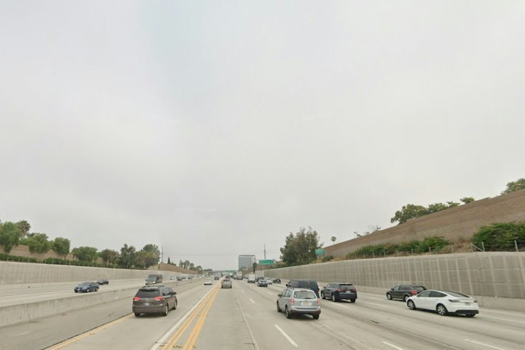 Rain Soaks Downtown LA Today as Sizzling 90s Heat Roars In By Weekend