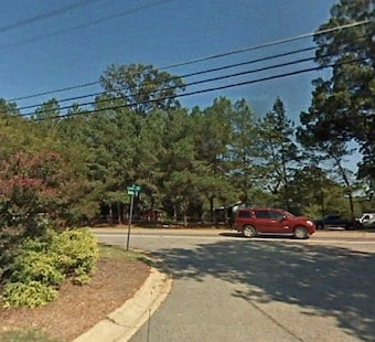 Raleigh Driver Dodges Turning Car, Clips Home Near Trawick Road Instead
