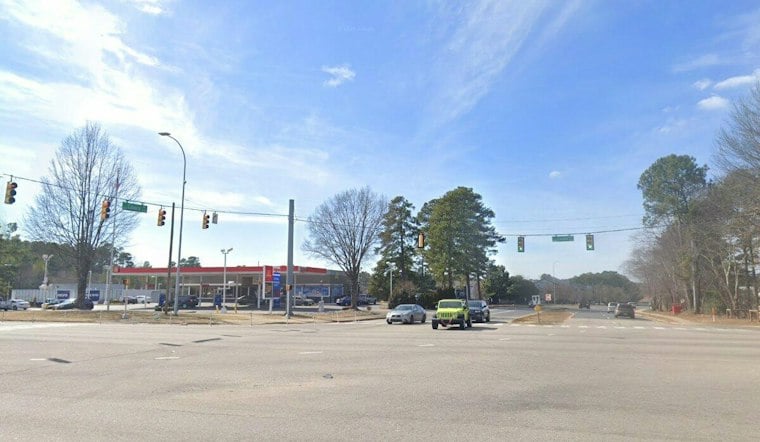 Red-Light Runner Slams Minivan Into Gas Station Sign on Capital Boulevard