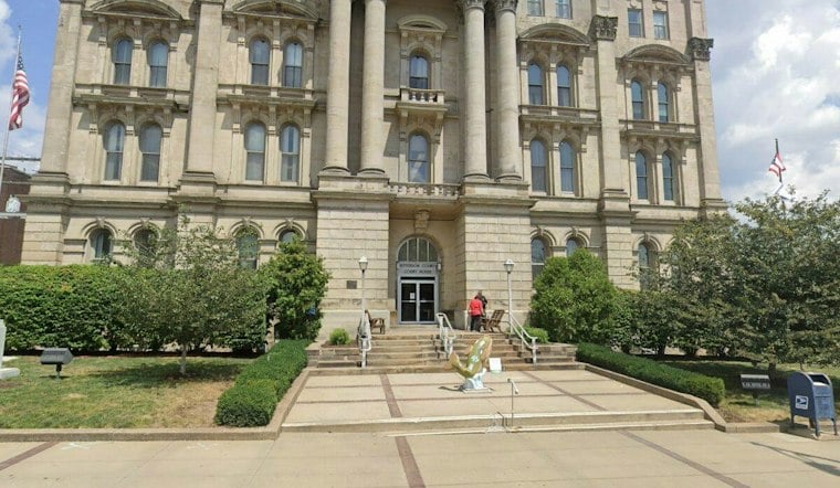 RI Democratic Party Chair's Husband Indicted Over $20M Ohio College Scheme