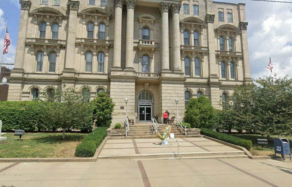 RI Democratic Party Chair's Husband Indicted Over $20M Ohio College Scheme