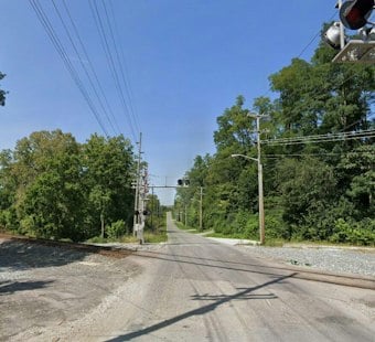 Richmond Police Shut Down Gravel Pit Road While Hunting For Mystery Man In Woods