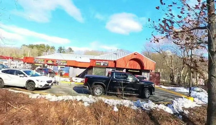 Salem Car Wash Worker's Window Drawings Win Over Autistic Boy's Heart
