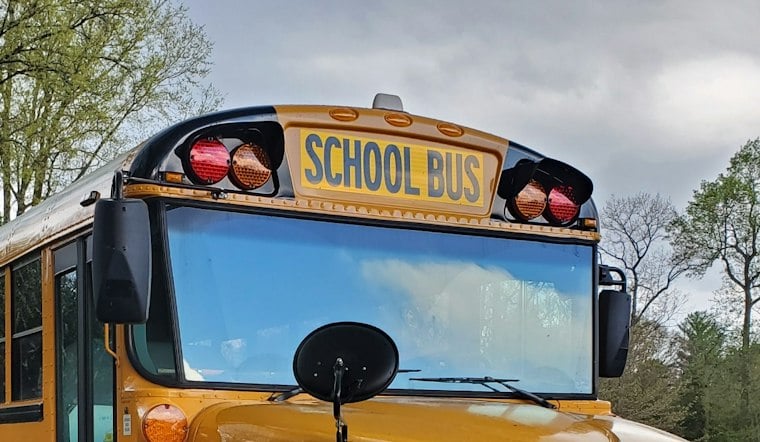 School Bus Bursts Into Flames on I-435 After Semi Crash, Two Hurt