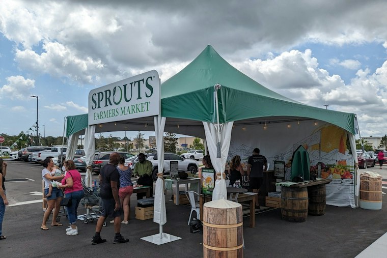 Sprouts Plants Its Flag in South Scottsdale Friday, Free Roses and Totes in Tow