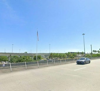 Stolen Truck Driver Rams Deputy Cruiser, Crashes Into Fence Near MIA