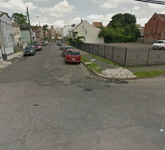 Stolen Van Rams Paterson Police Car, Chase Ends With Vehicle Stuck in Park Fence