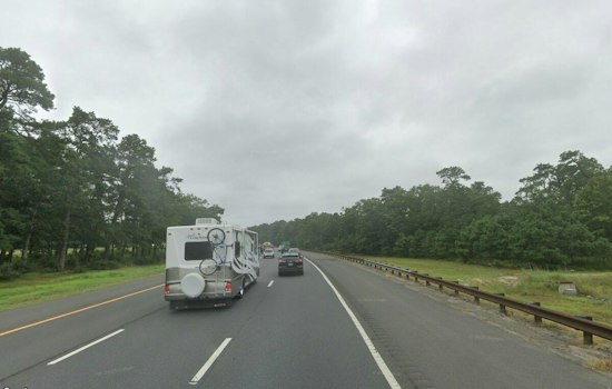 Tesla Driver Trapped After Car Veers Off Garden State Parkway, Hits Tree in Bergen County