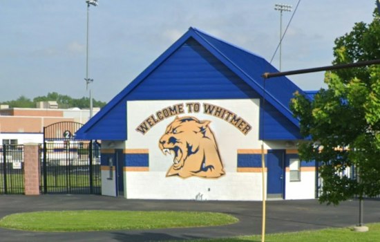Toledo Officer Trades Badge for Pom-Poms, Rejoins Whitmer Cheer Squad at Homecoming