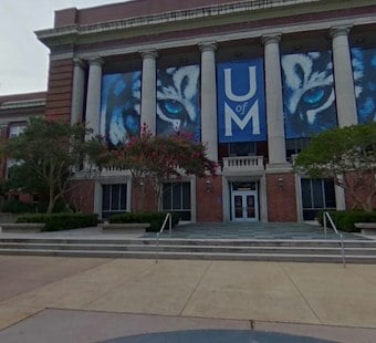 Turning Point USA Debate Draws Crowds, Clashing Signs at University of Memphis
