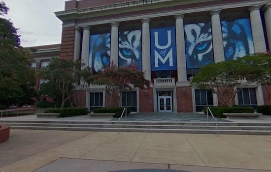Turning Point USA Debate Draws Crowds, Clashing Signs at University of Memphis