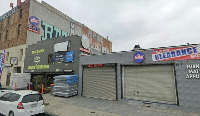 Unlicensed Driver Runs Red Light, Slams Minivan Through South L.A. Storefront