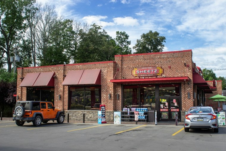 Van Slams Into Sheetz Sign in Guilford Township, Trapping Two Riders Inside