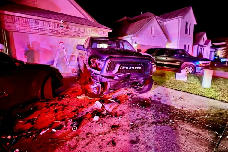 Vehicle Hits Two Cars in Driveway, Pushes One Into Home, Catches Fire