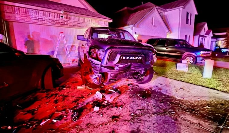 Vehicle Hits Two Cars in Driveway, Pushes One Into Home, Catches Fire
