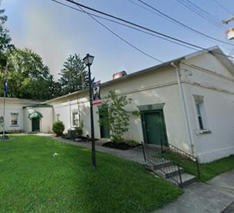 Vehicle Slams Into Louisa Apartment Building, Leaves Two Hurt