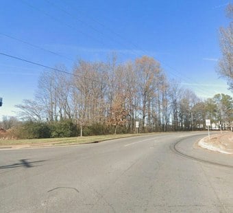 West Charlotte Shooting on Old Dowd Road Leaves One Victim Fighting for Life