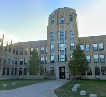 Woman, 23, Posed as Rufus King Substitute, Hit Kids With Slurs, Police Say