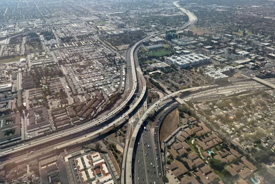 Woman Climbs Onto Sign Above Santa Ana Freeway, Shuts Down All Lanes of 55