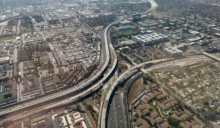Woman Climbs Onto Sign Above Santa Ana Freeway, Shuts Down All Lanes of 55