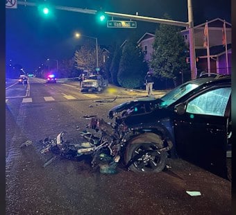 Woman Killed, Man Critical After Jeep Runs Red Light, Flips Into Crosswalk