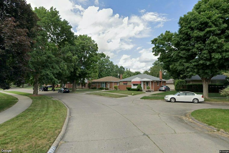 Woman Shot, Boy Hurt in Redford Township Domestic Assault, Suspect Flees in Land Rover
