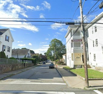 Woonsocket Residents Flee Through Back Window as Grove Street Fire Traps Them Upstairs