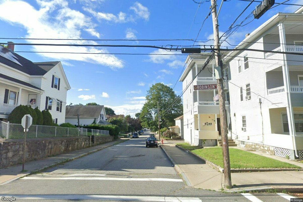 Woonsocket Residents Flee Through Back Window as Grove Street Fire Traps Them Upstairs