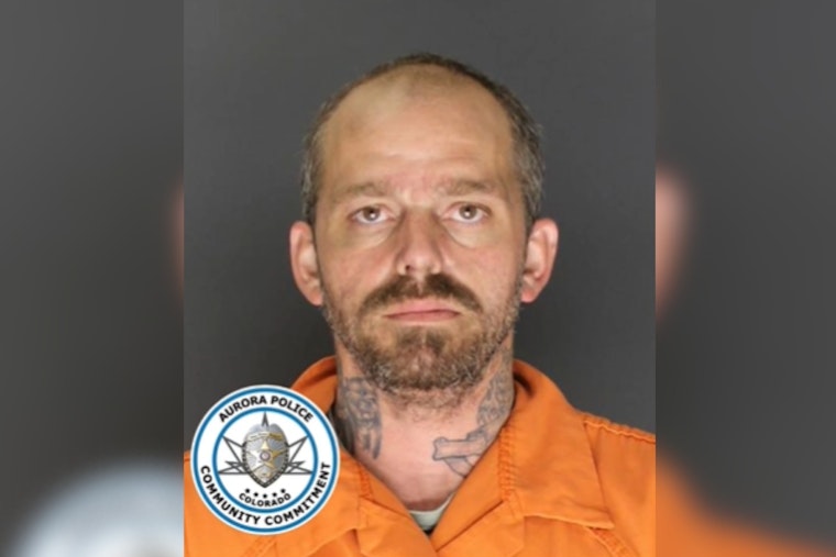 Aurora Expired-Tags Stop Erupts Into Fence-Smashing Chase