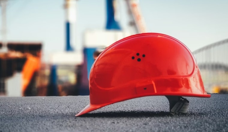 Cranes Soar, Paychecks Stall as Detroit Workers Miss the Comeback