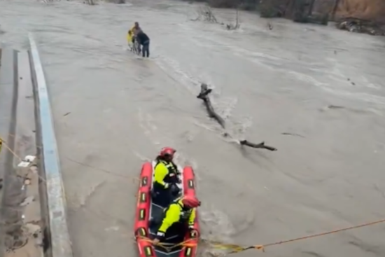Dallas Fire Crew Hauls Two Men And A Bike From Cottonwood Creek Floodwaters