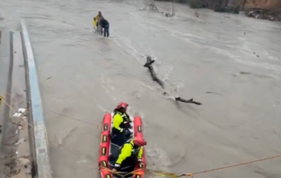 Dallas Fire Crew Hauls Two Men And A Bike From Cottonwood Creek Floodwaters