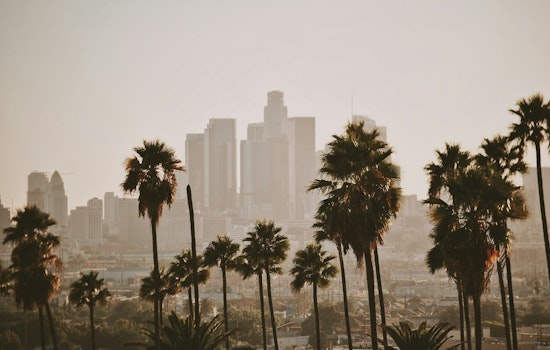Downtown L.A. Gets Soaked As Rain And Rowdy Winds Slam Commute