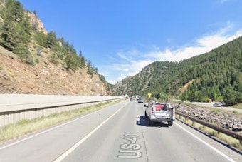 Driver Bolts from I-70 Crash Near Idaho Springs, Vanishes with Dog