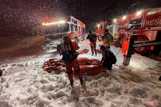 Driver Rescued After Pickup Truck Plunges into Retention Pond Amid Heavy Snow in East Charlotte