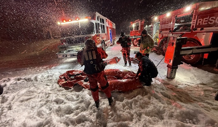 Driver Rescued After Pickup Truck Plunges into Retention Pond Amid Heavy Snow in East Charlotte