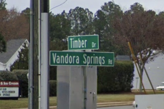 Driver Shot Behind The Wheel At Busy Garner Crossroads