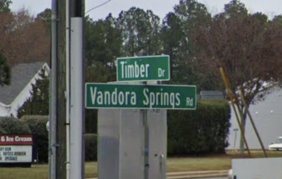 Driver Shot Behind The Wheel At Busy Garner Crossroads
